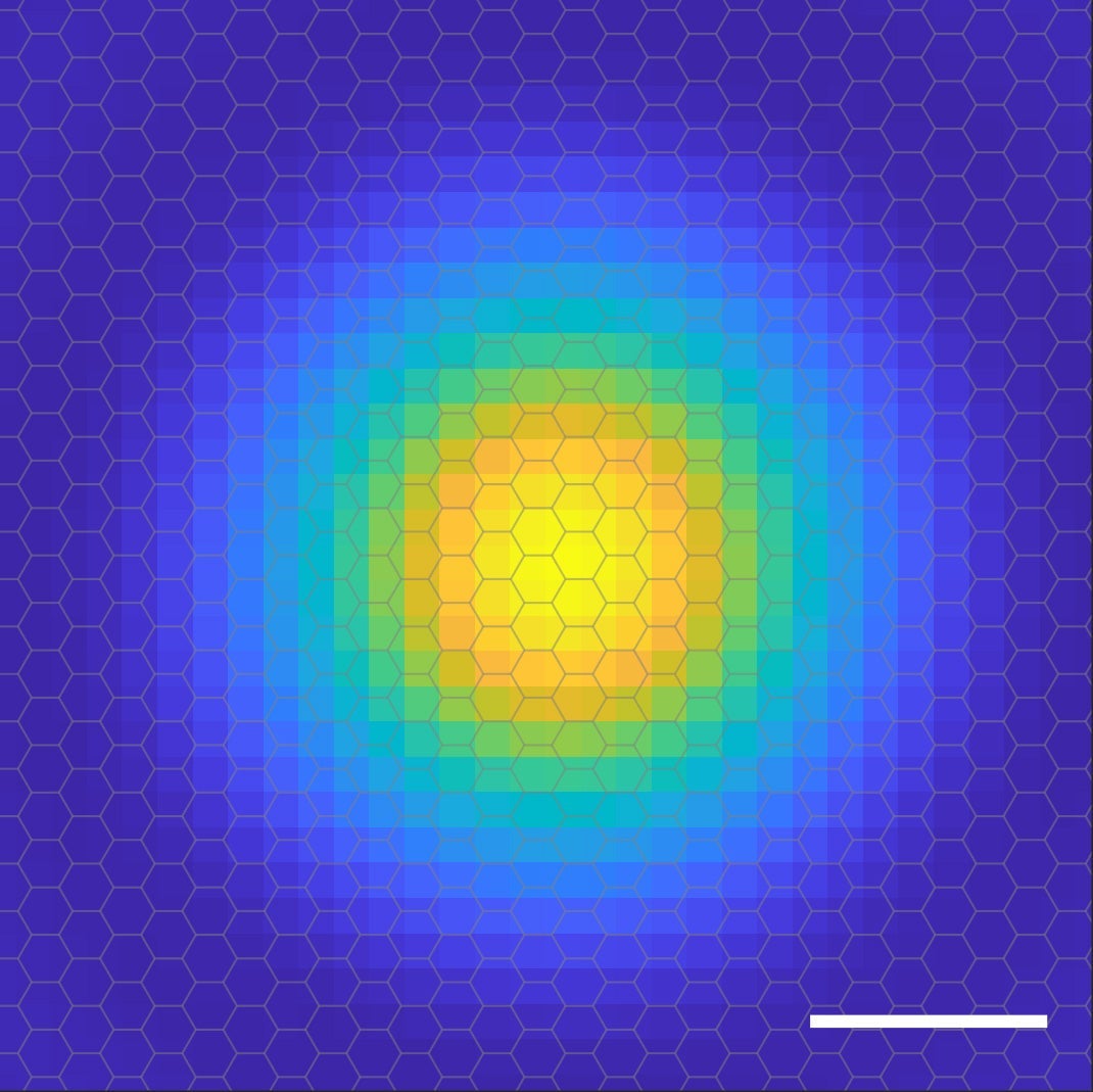 Illustration depicting the "probability cloud" of an electron in an exciton as a target pattern, with highest probability of finding the electron in the center (yellow) and four concentric rings of decreasing probability surrounding it.