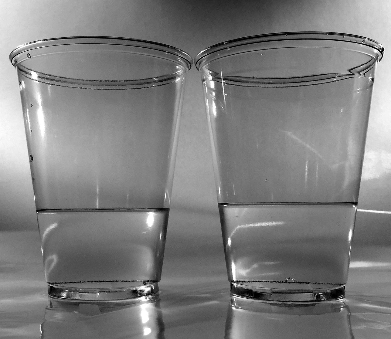 Image - Water cups used to illustrative 3-D negative electronic compressibility.