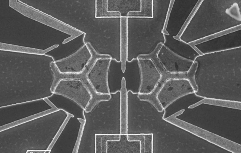 A grayscale image showing the outlines of a complex electrical device.