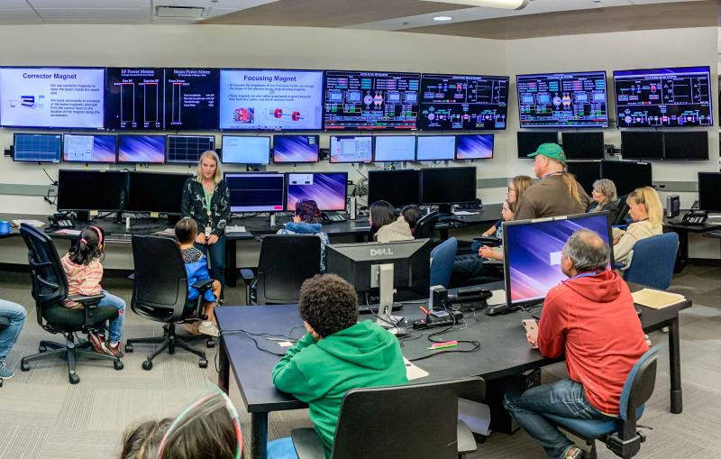 Visitors to SLAC tour the accelerator control room during Community Day 2019