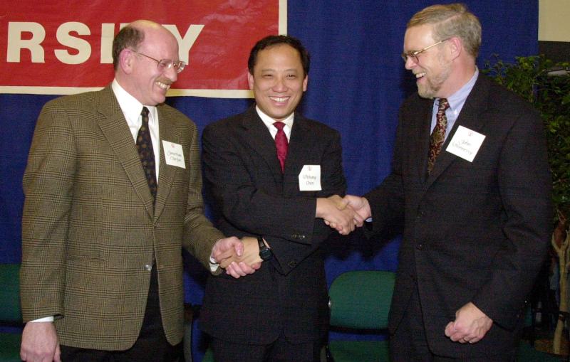 SLAC director Jonathan Dorfan; Pehong Chen, CEO of BroadVision; and President John Hennessy.