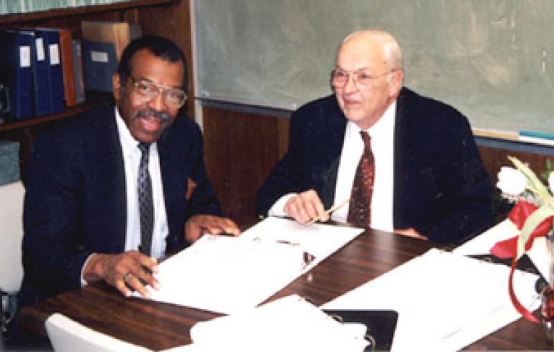 Jim Turner and Burter Richter at the official signing of the 400-odd page document.