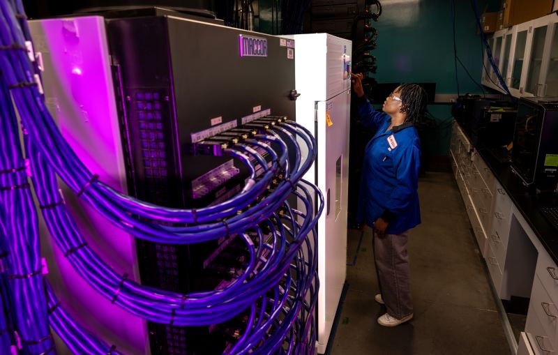 SLAC scientist working on batteries at scale in the SLAC–Stanford Battery Center in the Arrillaga Science Center 