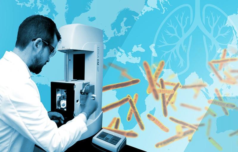A scientist working overlaid on a world map and images of tuberculosis bacteria.