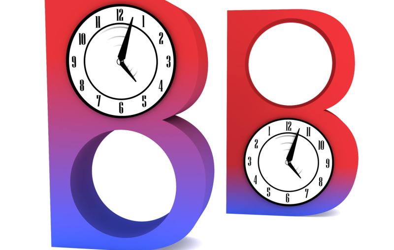 Image - Mirror images of "B" with clocks inside.