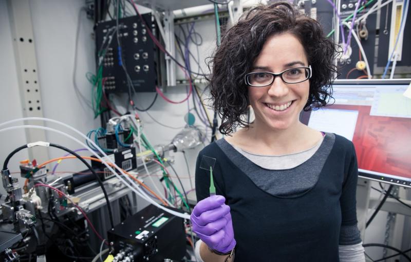 Lawrence Berkeley Lab chemist Anna Llordés with a sample of "smart" material for testing at SSRL Beam Line 11-3