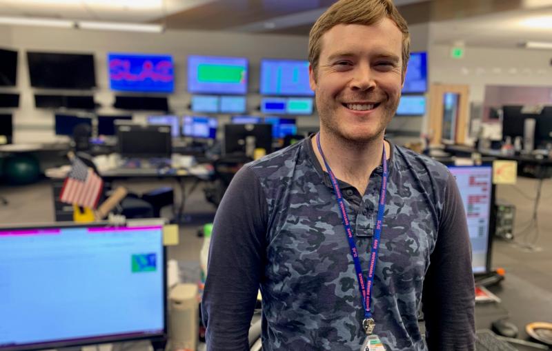 Ben Ripman in SLAC's accelerator control room.