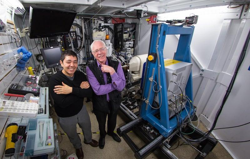 Alex Kintzer and Robert Stroud at SLAC's Stanford Synchrotron Radiation Light Source.