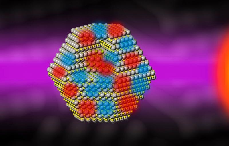 Illustration of three quantum dot nanocrystals showing atomic-level changes when they are hit with laser light 