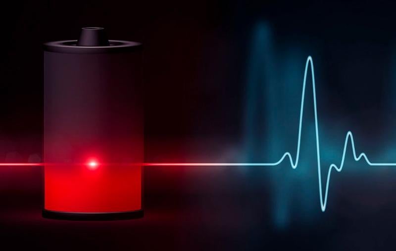 Conceptual illustration shows an EKG-like pulse of energy flatlining as it enters a battery, then coming back to life as it exits 