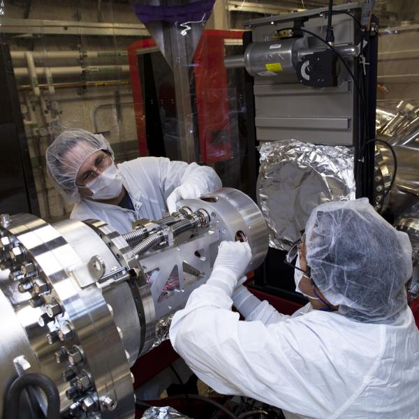 SLAC employees install the coherent X-ray imaging detector at the Linac Coherent Light Source facility.
