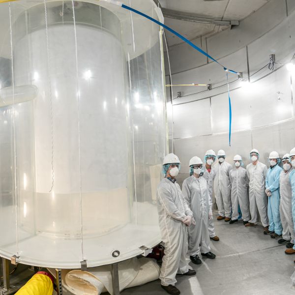 Members of the LZ team in the LZ water tank after the outer detector installation. 