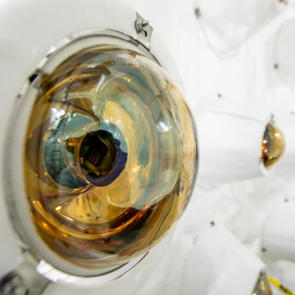 Light detectors line the outer layer of the LZ experiment.