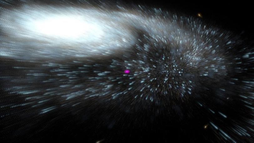 A gamma-ray photon interacts with relic starlight (NASA Goddard Space Flight Center/Cruz deWilde)