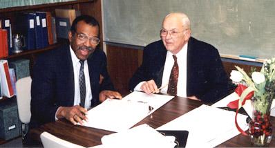 Jim Turner and Burter Richter at the official signing of the 400-odd page document.