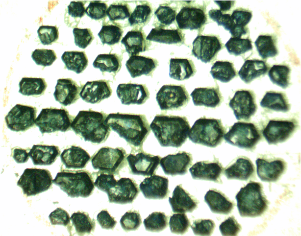 An assembly of blue-green crystals