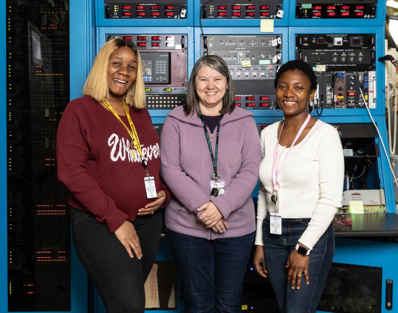 Three women standing
