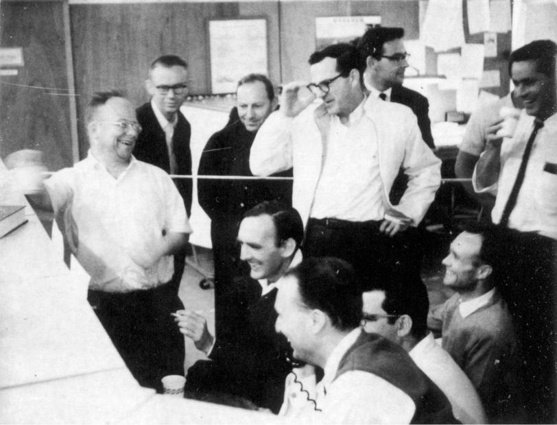 Photo - Archival photo of excited scientists in linac control room.