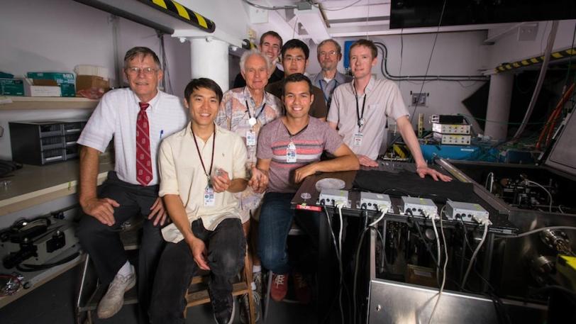 Many of the SLAC and Stanford researchers who helped create the accelerator on a chip are pictured in SLAC's NLCTA lab where the experiments took place. Left to right: Robert Byer, Ken Soong, Dieter Walz, Ken Leedle, Ziran Wu, Edgar Peralta, Jim Spencer a