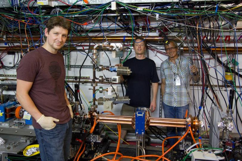 Image - From left: Eric Hemsing, Michael Dunning, and Stephen Weathersby assisted with the microwave undulator project at SLAC. (Glenn Roberts Jr./SLAC)