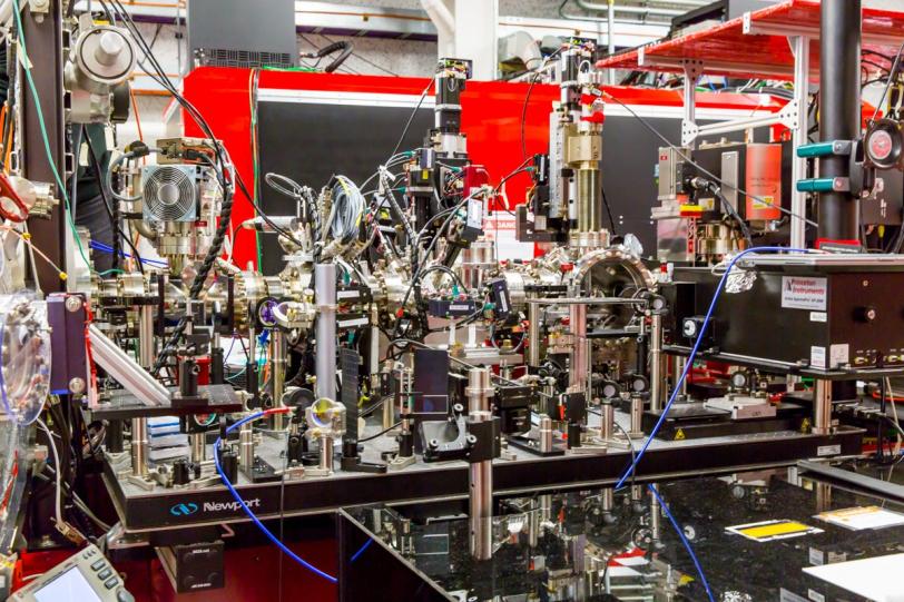 Photo - An equipment table at the Coherent X-ray Imaging (CXI) experimental station at SLAC's LCLS. The equipment was put to use in an experiment studying the shocked state of titanium and titanium alloys. (Fabricio Sousa/SLAC)