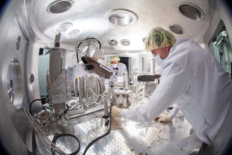 Image - Scientists prepare for an experiment at SLAC's Matter in Extreme Conditions station, part of the Linac Coherent Light Source X-ray laser. (SLAC National Accelerator Laboratory)
