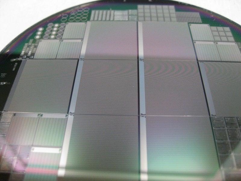 Photo - Several 3-D sensors etched into a silicon wafer