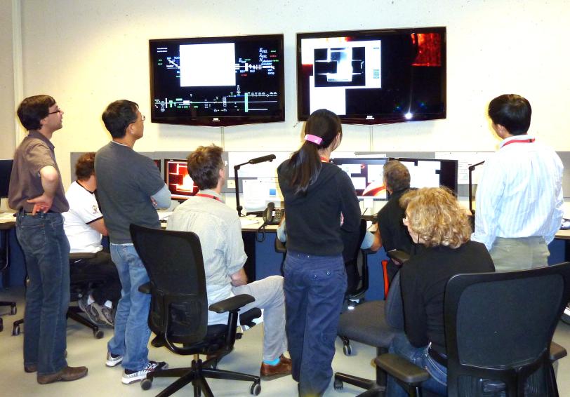 Image - Scientists in a control room monitor the first experiment at SLAC's Linac Coherent Light Source. (Courtesy Linda Young)