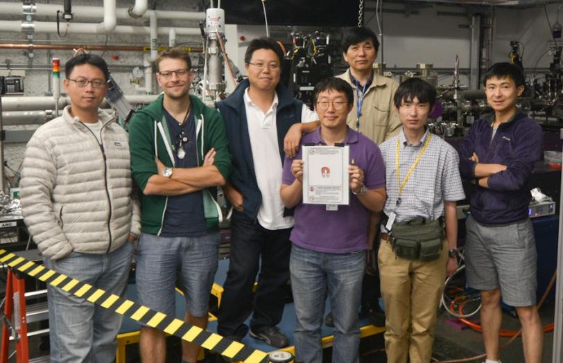 Image - Members of the team that discovered a new, 3-D effect in a superconducting material gather at the X-ray Correlation Spectroscopy experimental station at SLAC’s Linac Coherent Light Source X-ray laser. (SLAC)
