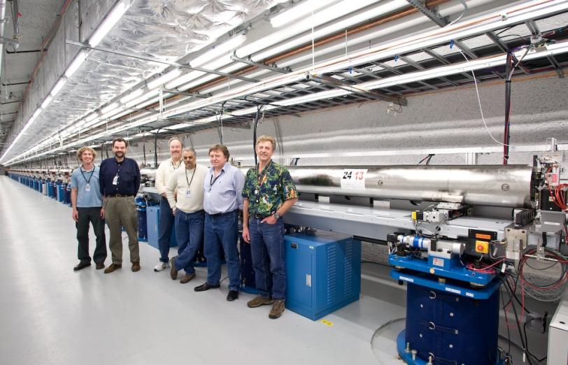 Image - Some of the LCLS team members stand by the newly installed undulators in this 2009 photo. From right: Mike Zurawel, Geoff Pile from Argonne National Laboratory, Paul Emma, Dave Schultz, Heinz-Dieter Nuhn and Don Schafer. (Brad Plummer) 