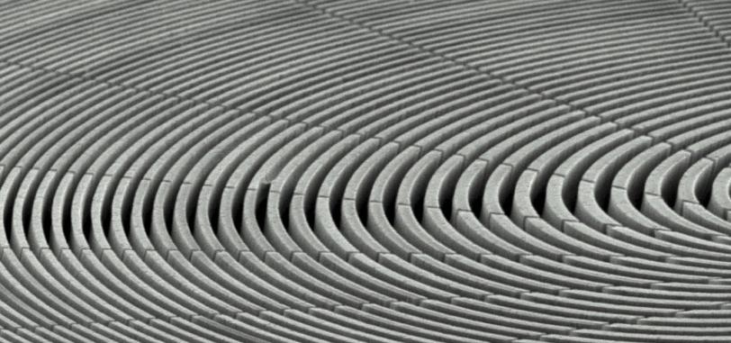 Image - Scanning electron microscope (SEM) image of a zone plate pattern produced using a chemical etching technique invented at SLAC. (Chieh Chang, Anne Sakdinawat)