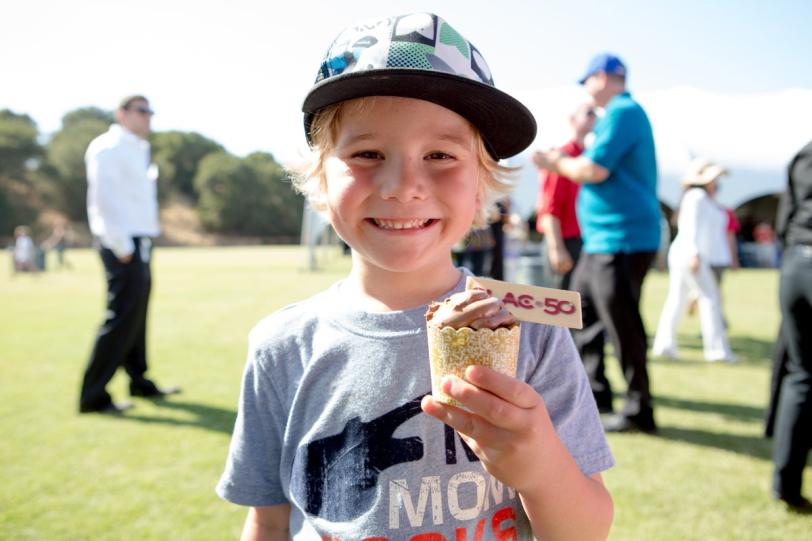  A youngster enjoying a treat at SLAC's 50th celebration