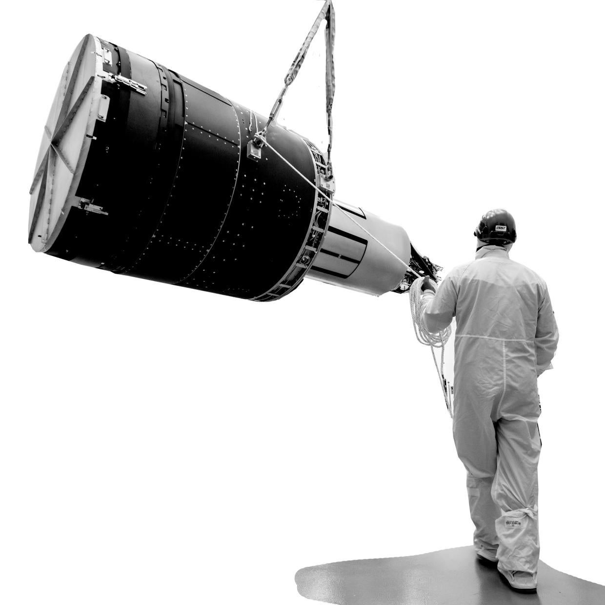 size comparison of camera body to a human next to it 