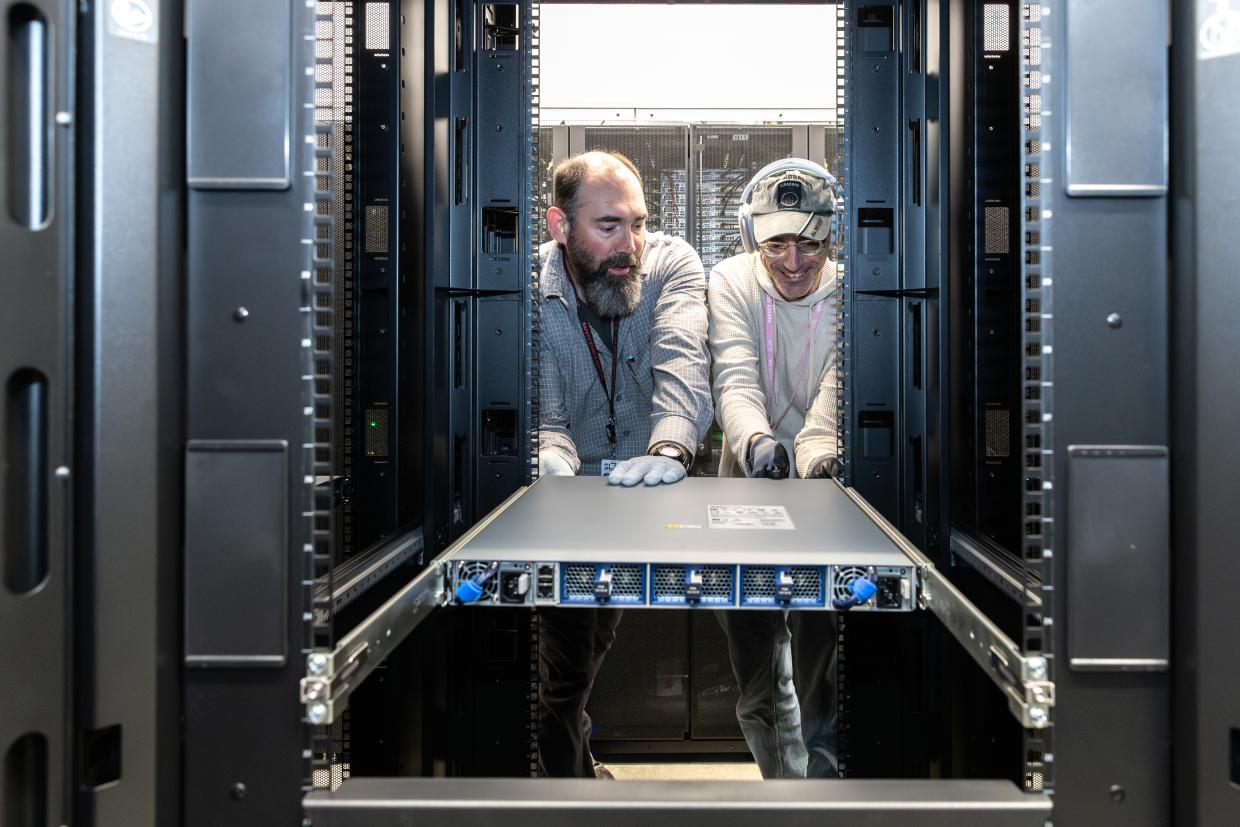 Adam Bolton (left) and Riccardo Veraldi (right) working at the Stanford Research Computing Facility (SRCF) on the SLAC campus. SRCF's U.S. Data Facility is the main hub of Rubin's data infrastructure.