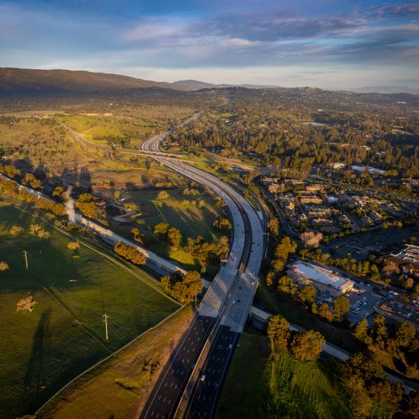 Drone view of Interstate 280 going over linac bridge looking north.