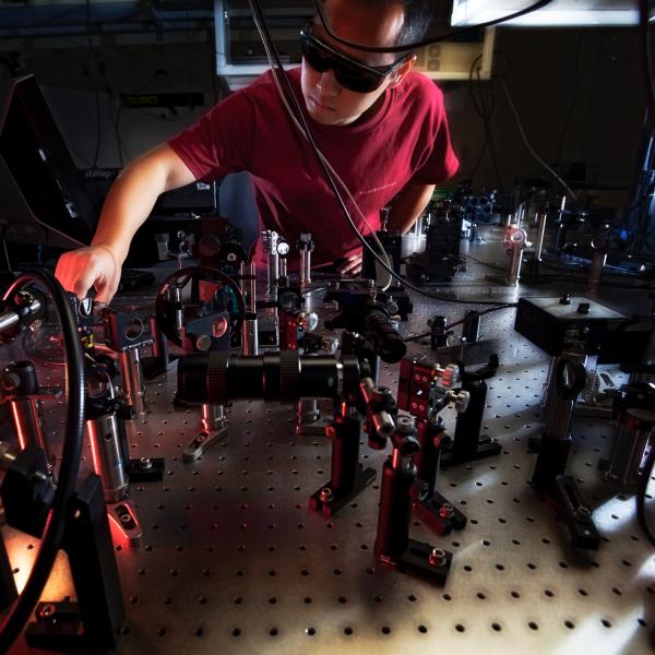 PULSE graduate student Jian Chen in a laser lab at SLAC.