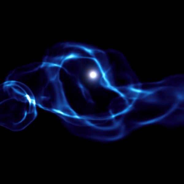 computer-simulated image shows gas interacting with one of the first black holes in the early universe