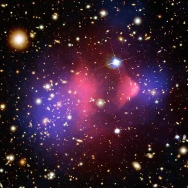 clusters of galaxies collide showing separation of dark matter