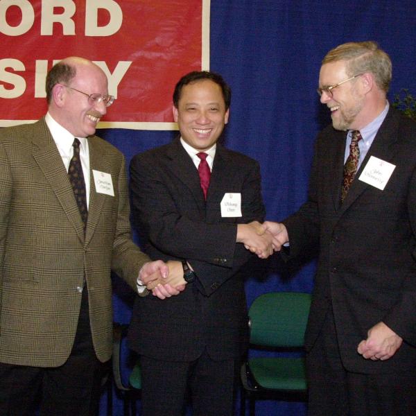 SLAC director Jonathan Dorfan; Pehong Chen, CEO of BroadVision; and President John Hennessy.