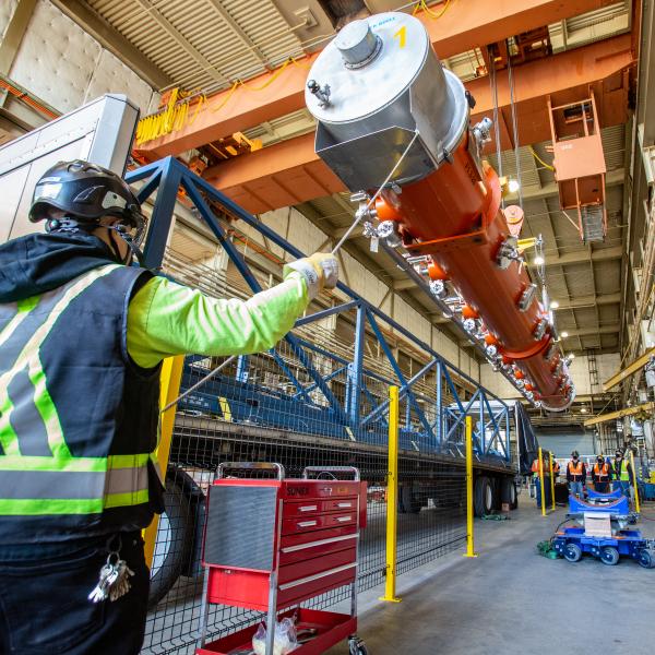 The first of 23 cryomodules is delivered to SLAC for the high energy upgrade to the Linac Coherent Light Source