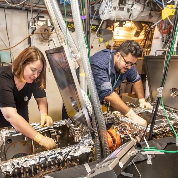 SLAC’s Emma Snively and Mohamed Othman at the lab’s high-speed “electron camera."