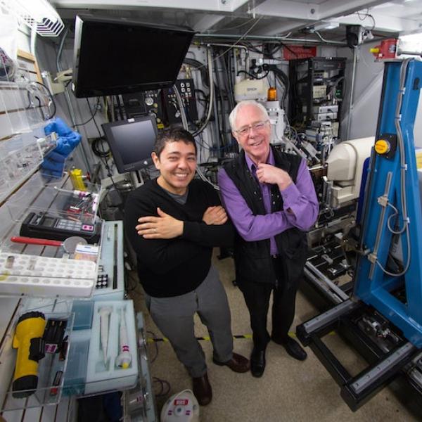 Alex Kintzer and Robert Stroud at SLAC's Stanford Synchrotron Radiation Light Source.