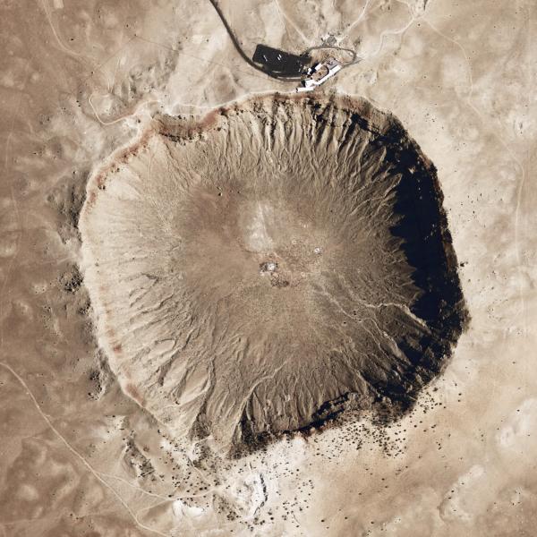 Image - Meteor Crater, formed by a meteorite impact 50,000 years ago in Arizona, produced a hard, compressed form of silica known as stishovite. Researchers measured the transformation of a fused silica glass into stishovite using SLAC's X-ray laser.