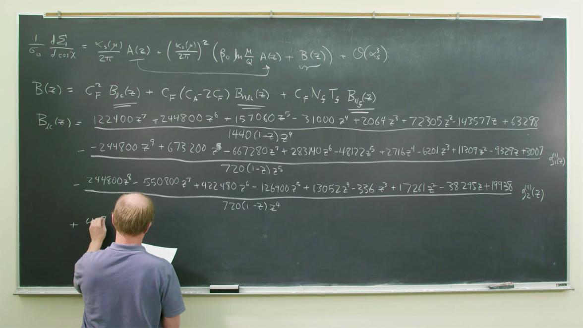 SLAC theorist Lance Dixon writes out a new formula.