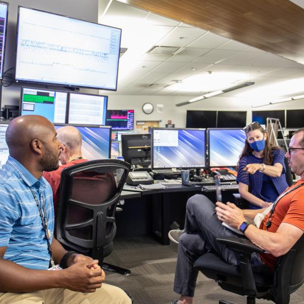 At left is physicist Dorian Bohler. Staff gathered in Bldg 52's main control room on October 6, anticipating seeing the first electrons from LCLS-II. 
